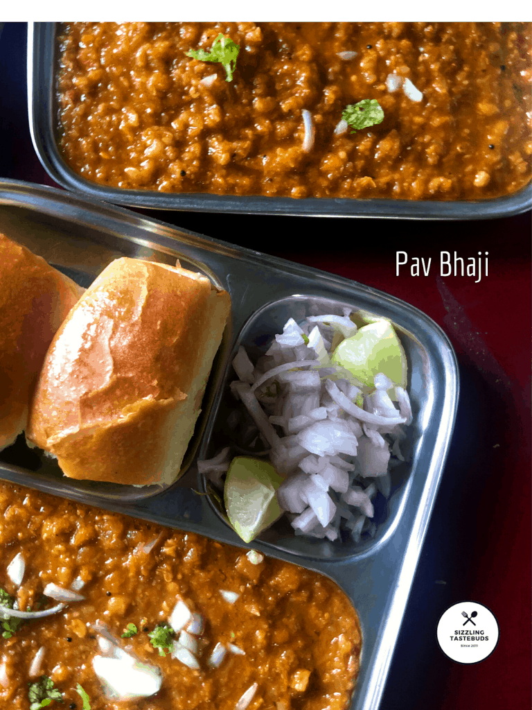 Mumbai's famous Pav Bhaji version is a very popular street food. It is a medley of veggies in a spicy, tangy tomato based sauce simmered and served with pav (local bread)