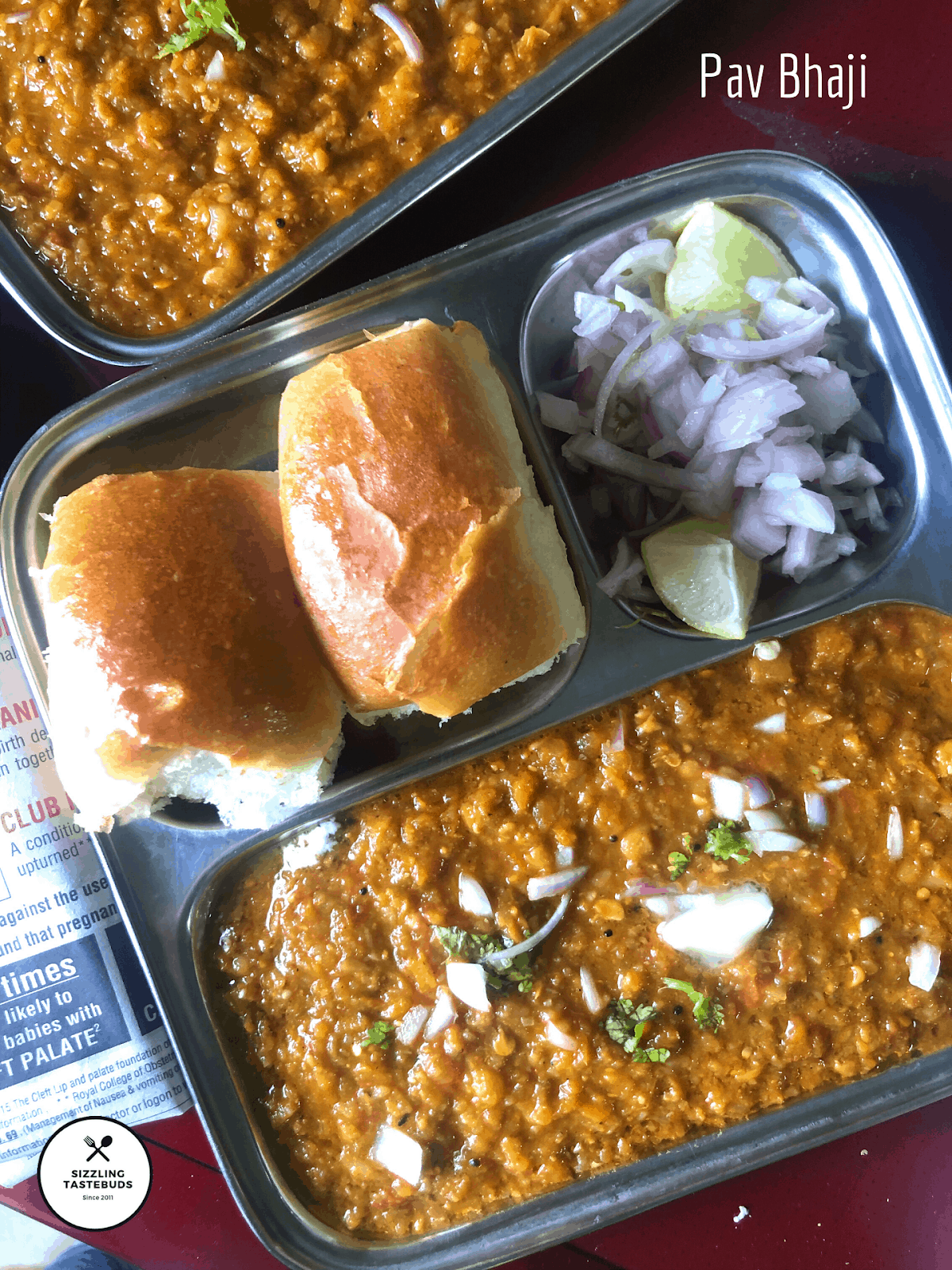 Mumbai's famous Pav Bhaji is a very popular street food. It is a medley of veggies in a spicy, tangy tomato based sauce simmered and served with pav (local bread)