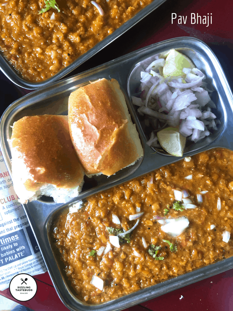 Mumbai's famous Pav Bhaji version is a very popular street food. It is a medley of veggies in a spicy, tangy tomato based sauce simmered and served with pav (local bread)
