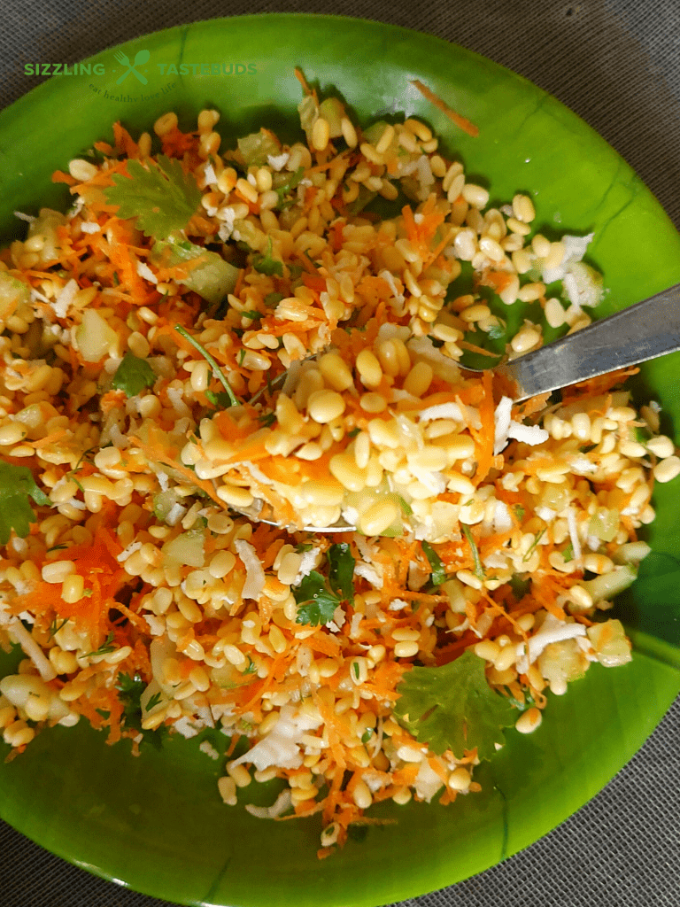 Moong dal Kosambari is a light salad made with split green gram and served as a salad or Prasad during Festivals. Sometimes, grated carrot or minced cucumber is also added to this.