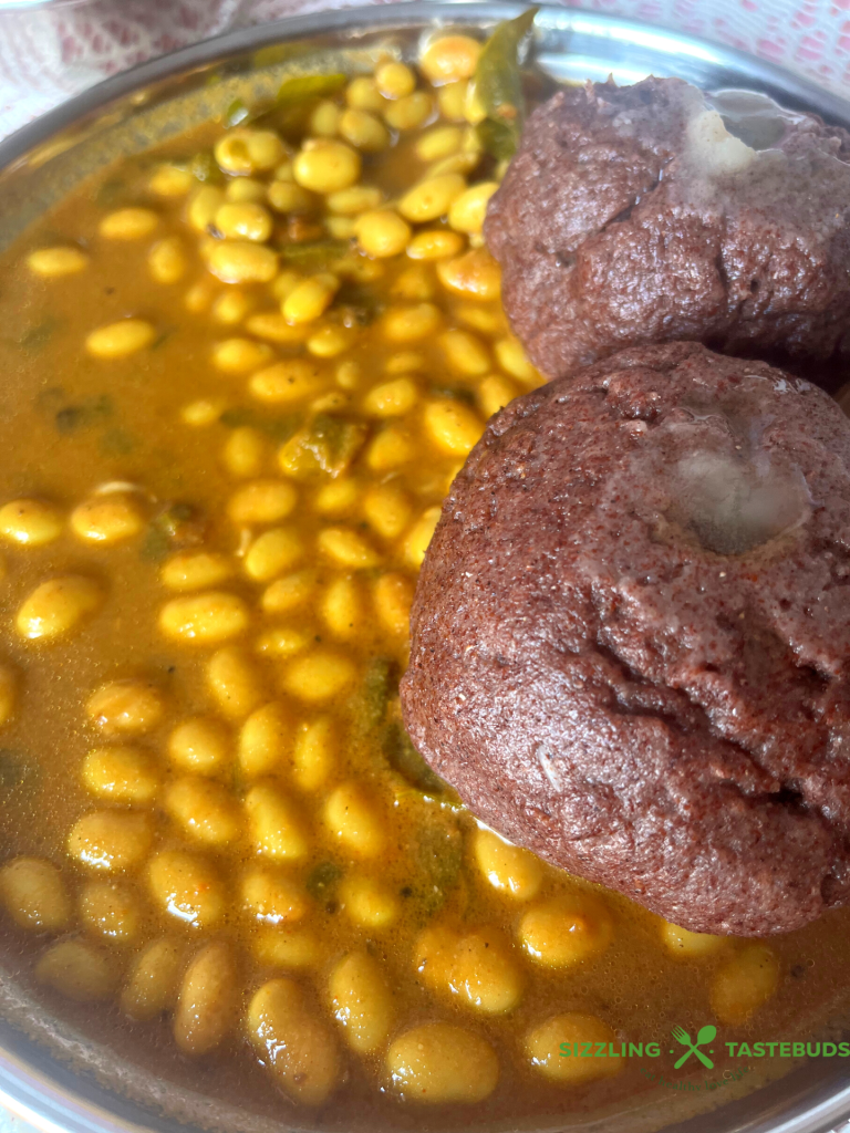 A traditional Karnataka style steamed finger millet dumpling. Served with sambhar or curry for a filling meal