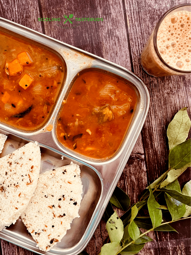 Pepper Idli or Milagu Idly is an Idli variant with whole peppercorns and spices added to the batter and steamed. Served with chutney or sambar