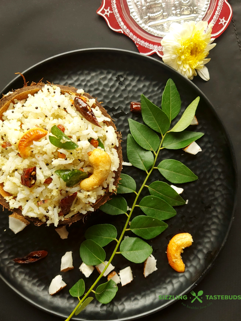 Thengai Saadam or Temple Style Cooconut RIce is a No onion No garlic Tempered Rice with Grated Coconut and basic spices.