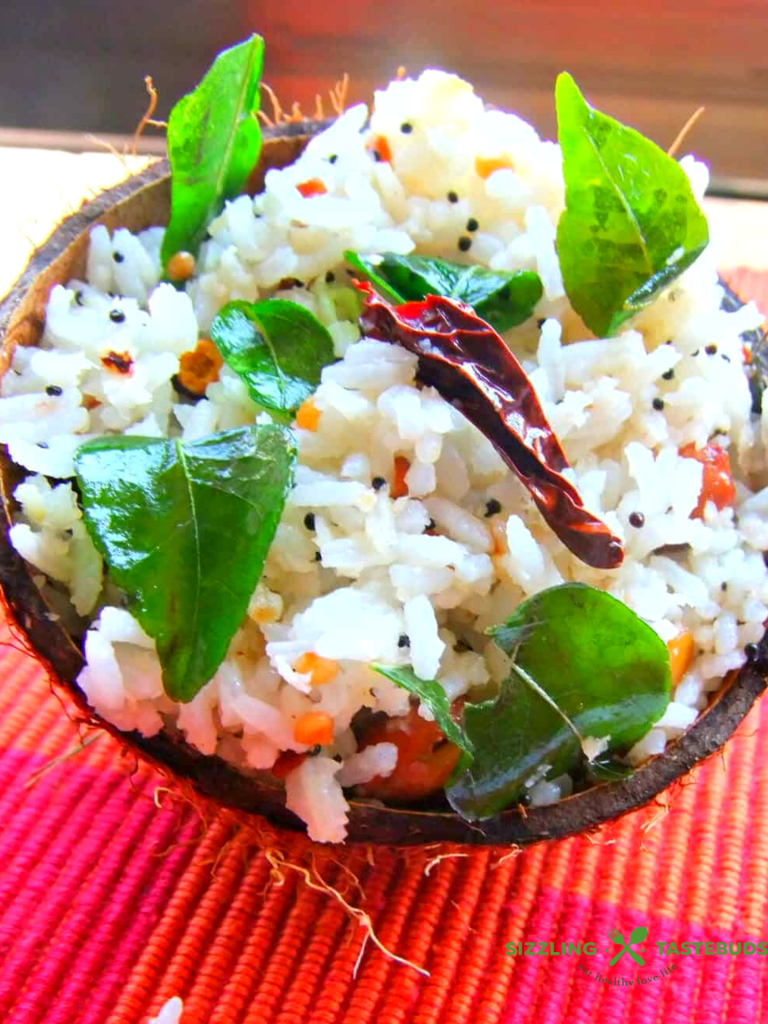 Thengai Saadam or Temple Style Cooconut RIce is a No onion No garlic Tempered Rice with Grated Coconut and basic spices.