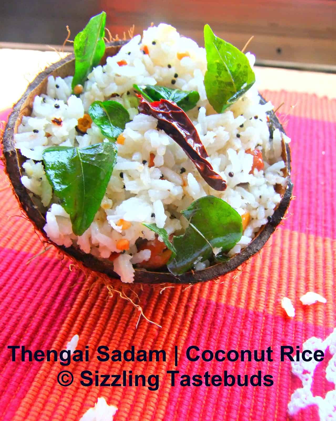 Thengai Saadam or Temple Style Cooconut RIce is a No onion No garlic Tempered Rice with Grated Coconut and basic spices.