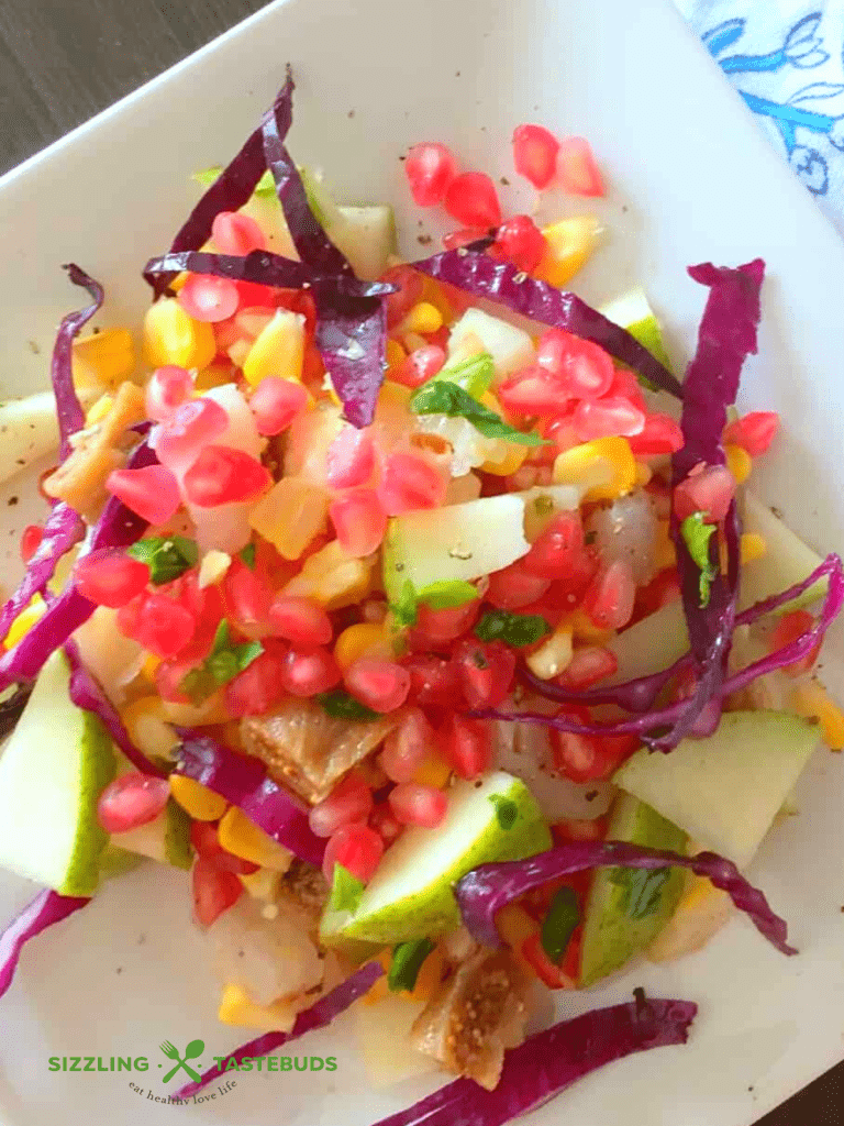 Pear Pomegranate Salad with Apple Cider dressing is a quick and delicious fuss-free salad perfect for Spring or Summer, eaten as a salad or meal by itself