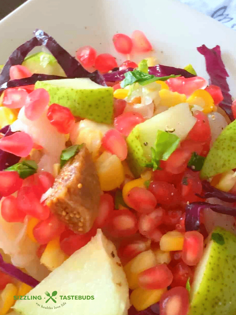 Pear Pomegranate Salad with Apple Cider dressing is a quick and delicious fuss-free salad perfect for Spring or Summer, eaten as a salad or meal by itself