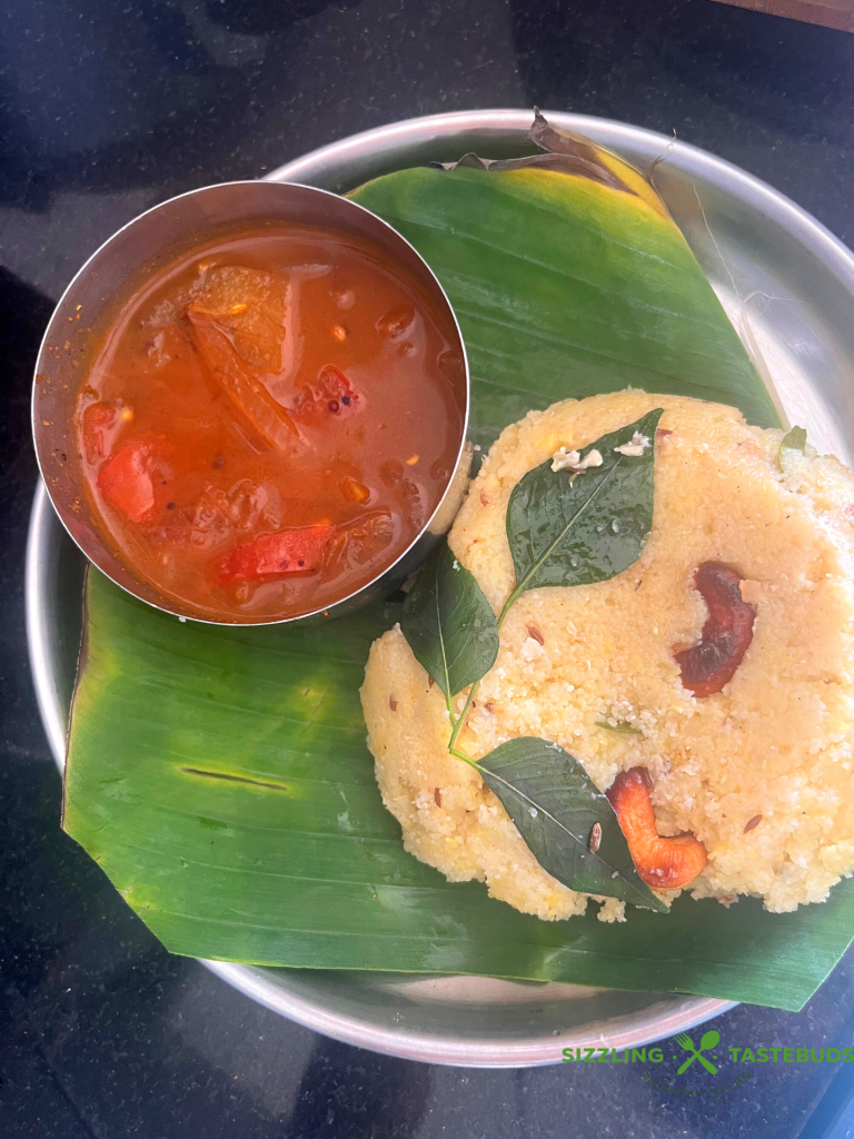 Rava Pongal is a soft, delicious savoury pudding made with Semolina (Rava) and cooked Moong dal (lentil). Served as a breakfast or light dinner with chutney / sambhar.