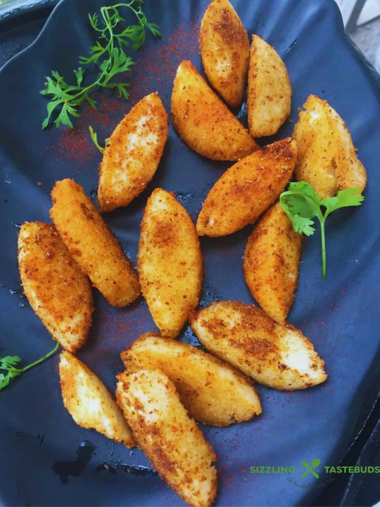 Baked Idli Fry is a low calorie, baked snack with leftover Idlis - a snack that is irresistible and addictive in taste and flavour.