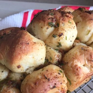 Let's bake this garlicky, fun to make and eat Pull Apart Monkey Bread. Best served warm with a soup and salad.