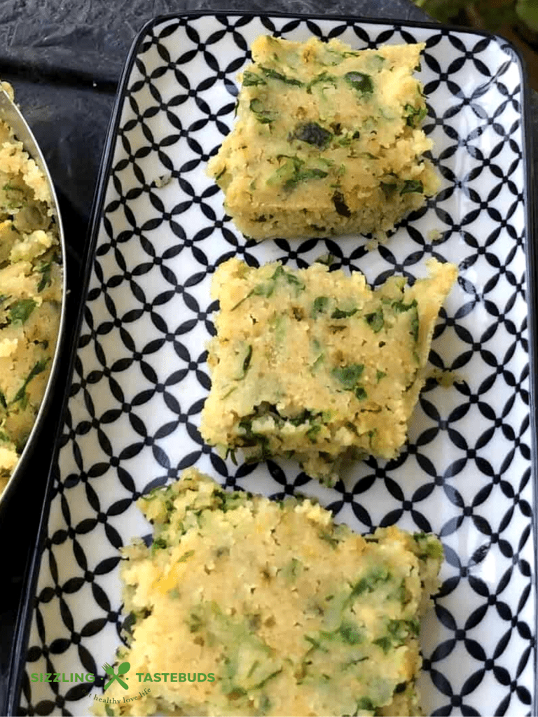 Oats Methi Dhokla is a spongy, soft and steamed snack using Oats and fenugreek leaves. Served with Green chutney or some sauce.