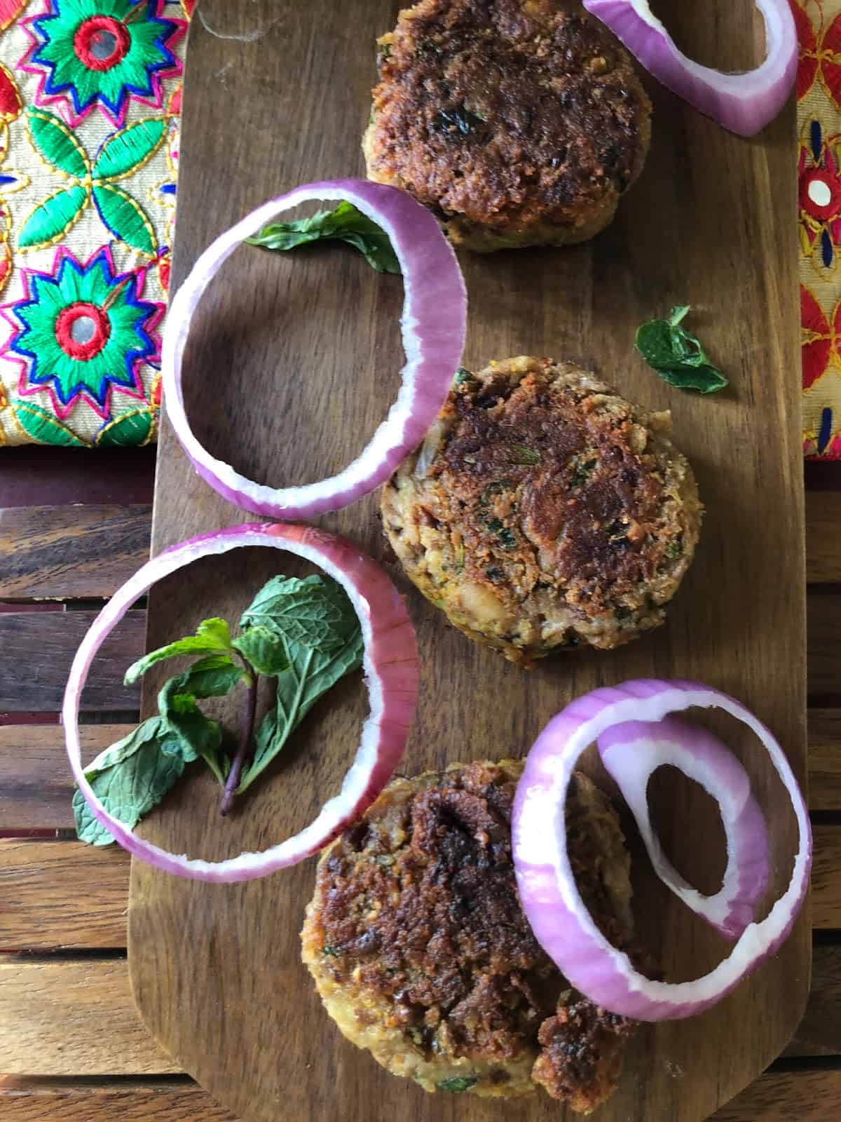 Galouti Kebab or Galoti Kebab is a melt-in-the-mouth vegetarian version of the famous Lucknowi Galoti Kebab. Often served at Iftar or parties with a yogurt-mint dip