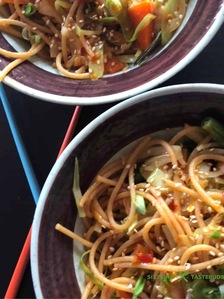 Vegan udon stir-fry is a flavorful plant-based noodle dish with fresh vegetables, a spicy umami sauce and is perfect for a quick and healthy meal.