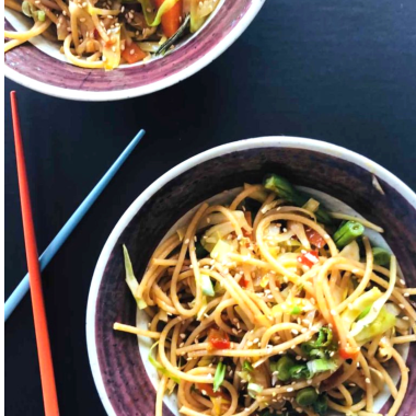 Vegan udon stir-fry is a flavorful plant-based noodle dish with fresh vegetables, a spicy umami sauce and is perfect for a quick and healthy meal.