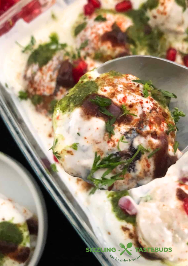 No fry Dahi Bhalle are non-fried lentil dumplings soaked in a spicy tangy, sweet yogurt sauce. Perfect for Holi, Diwali or any other celebrations.