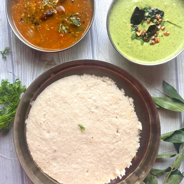 Thatte Idli is a famous gluten free,vegan breakfast dish from Bidadi (outskirts of Bangalore) where batter is steamed in leaf lined flat plates which gives its characteristic shape and softness