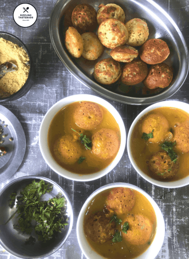 Darshini Style Bonda Soup is a protein rich Snack / Appetiser which is NOT deep fried. The lentil dumplings are served in an aromatic soup like broth