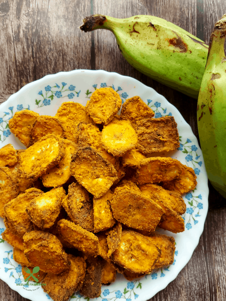 Airfryer Banana Crisps is a low cal and low carb GF, Vegan Snack made with raw banana, Chickpeas flour and basic spices. SErved as a side or a snack