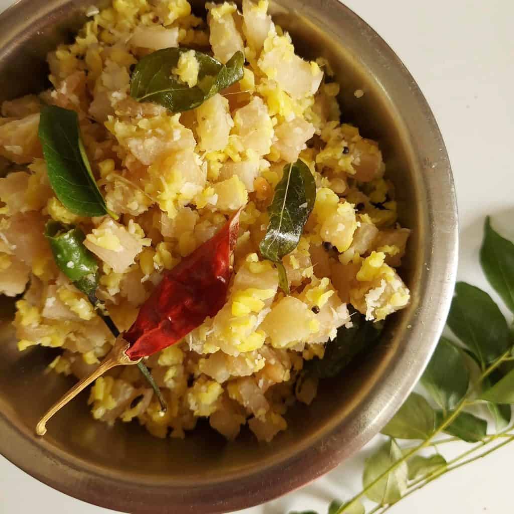 Vazhai Thandu Usli or Banana Stem dry Curry is a healthy vegan, GF dish made with Chopped Banana pith and lentils. Served as a accompaniment to Rasam or Sambhar.