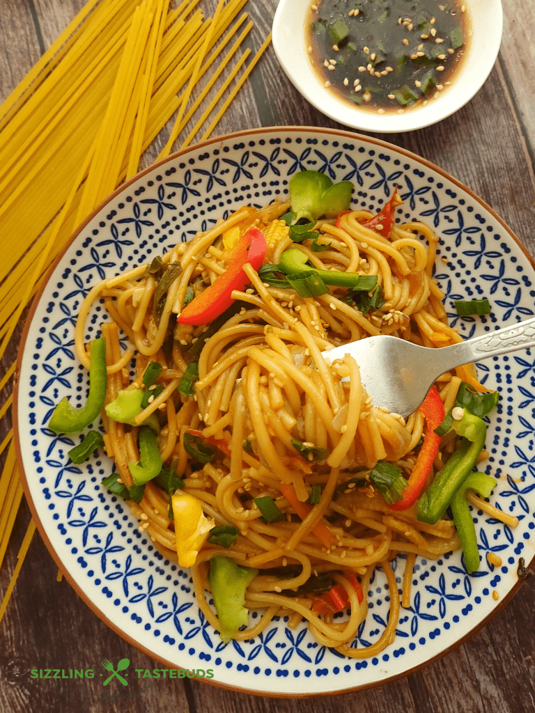 Instant Pot Asian Style Veg Noodles is a delicious One Pot meal. Makes for a great lunch / dinner / brunch option. 