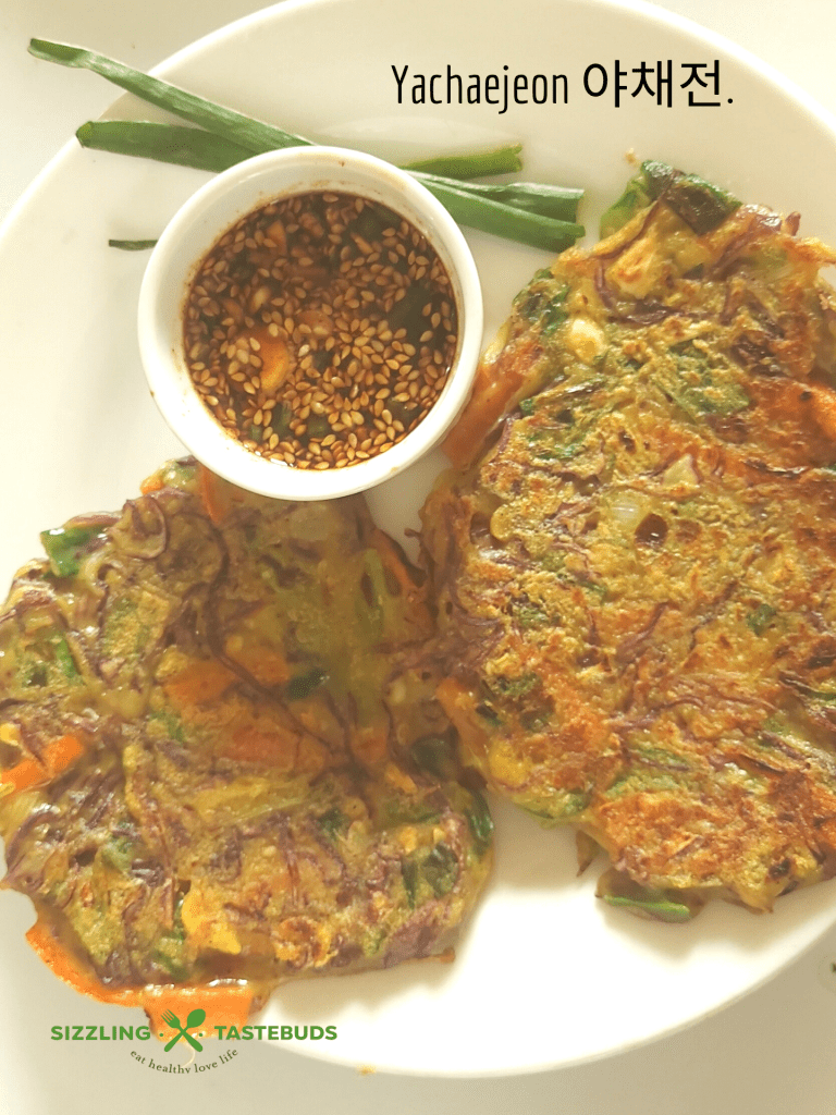 Vegan Yachaejeon (Korean pancakes) are savoury pancakes loaded with veggies and served with a dipping sauce. Can be served for breakfast or snack