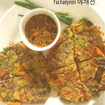 Vegan Yachaejeon (Korean pancakes) are savoury pancakes loaded with veggies and served with a dipping sauce. Can be served for breakfast or snack