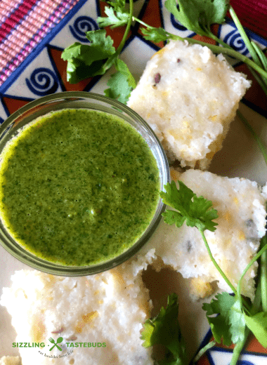 Brown Rice Corn Dhokla is a Gluten free steamed snack, made from Brown Rice and Corn. Served with Mint - Coriander Chutney