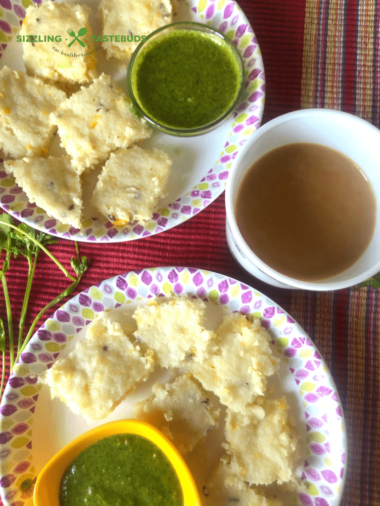 Brown Rice Corn Dhokla is a Gluten free steamed snack, made from Brown Rice and Corn. Served with Mint - Coriander Chutney