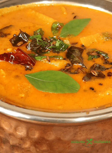 Kadag Puli is a traditional Iyengar dish which is satvik (No Onion No garlic) curry. Best served with steamed rice /chapatis. It is a medley of native veggies in an umami-tangy sauce