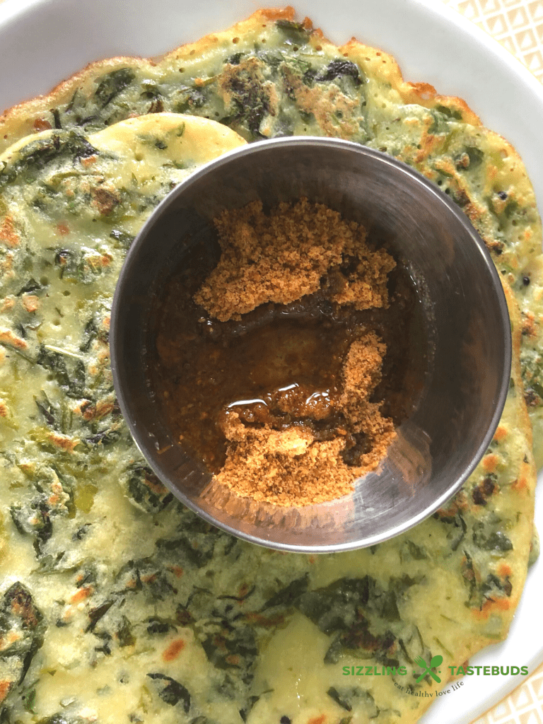 Besan Methi Cheela is a Gluten Free + Vegan Savory pancake made with Fresh Fenugreek leaves and Chickpea flour.