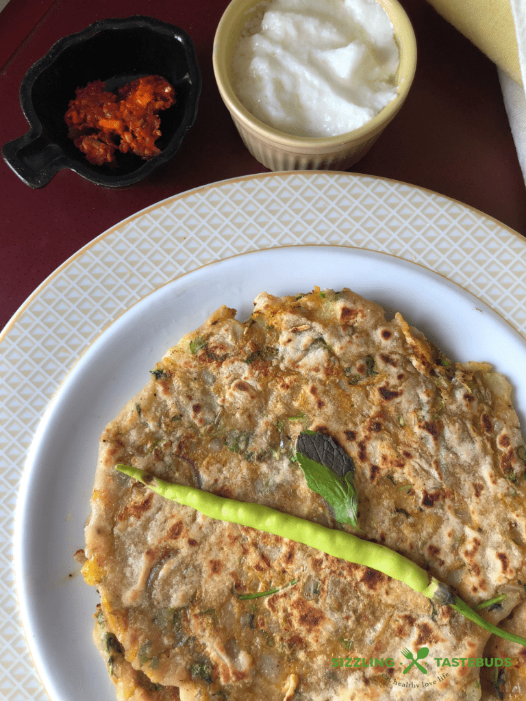 Masala Alu Paratha is a delicious and filling Spiced Potato flatbread, shallow fried in a pan., Served with Yogurt / pickle for breakfast, lunch or dinner