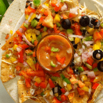Baked Roti Nachos is a quick fusion snack made with left rotis (Indian Flatbread). Indo-mex fusion that is a great hit at parties or potluck