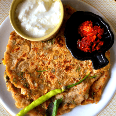 Masala Alu Paratha is a delicious and filling Spiced Potato flatbread, shallow fried in a pan., Served with Yogurt / pickle for breakfast, lunch or dinner