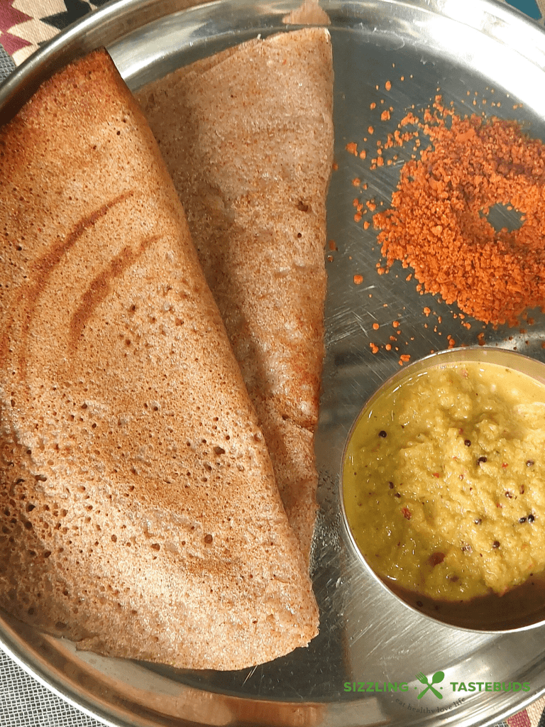 Instant Ragi Oats Dosa is a quick and filling Gluten Free Vegan dosa made with finger millet and Oats. Can be served for breakfast or snack, even dinner.