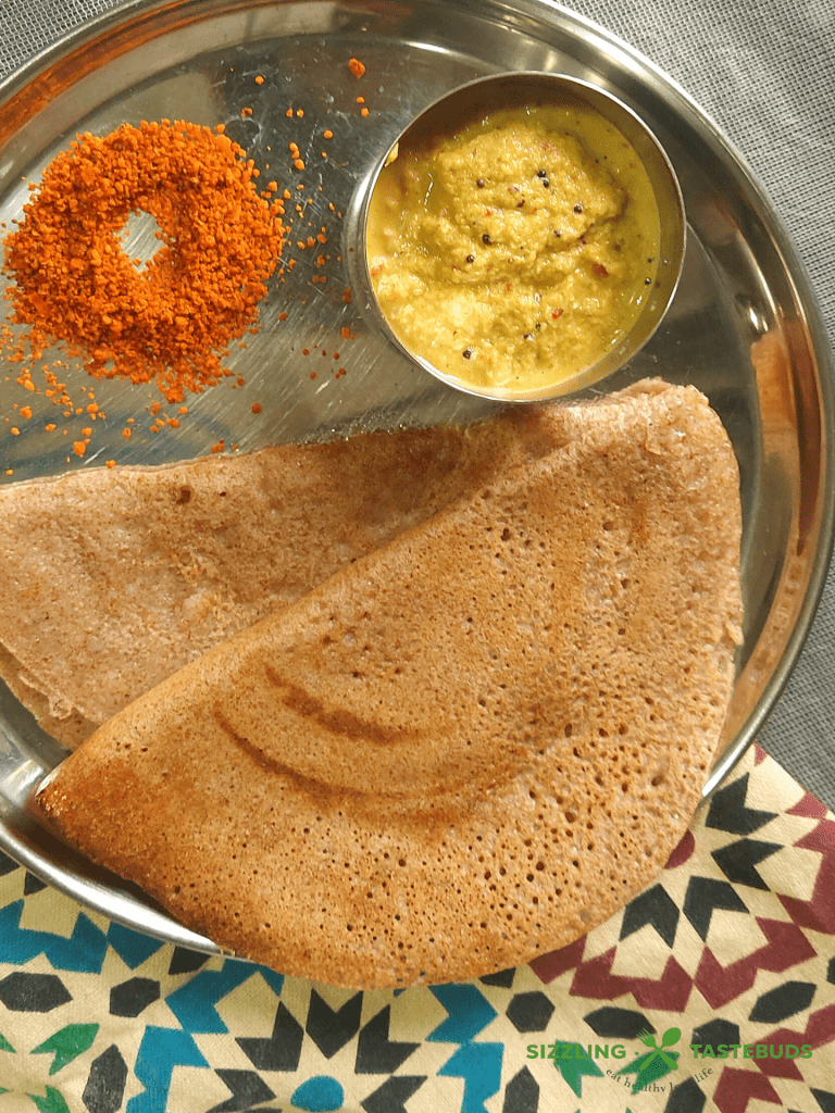 Instant Ragi Oats Dosa is a quick and filling Gluten Free Vegan dosa made with finger millet and Oats. Can be served for breakfast or snack, even dinner.