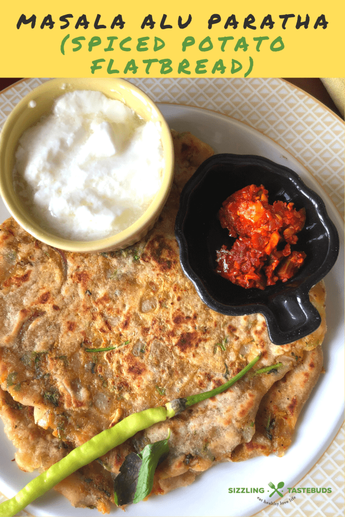 Masala Alu Paratha is a delicious and filling Spiced Potato flatbread, shallow fried in a pan., Served with Yogurt / pickle for breakfast, lunch or dinner