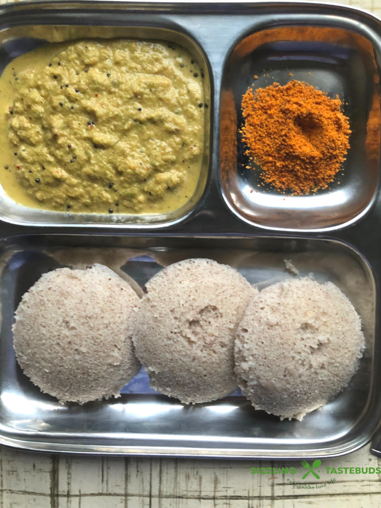 Ragi Idli is a fermented Idli (steamed savoury breakfast) made with Finger Millet and Lentils. Served with Sambhar & chutney as Breakfast / Snack 
