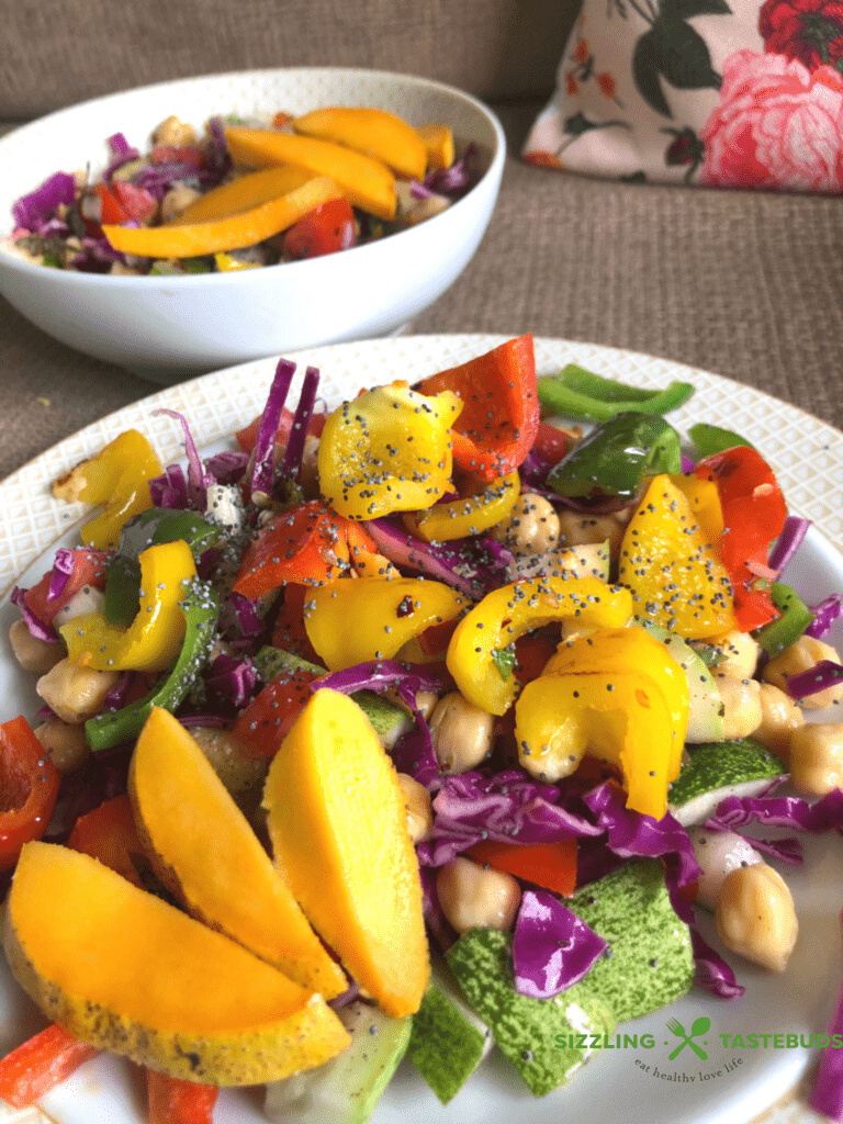 Roasted Peppers Chickpeas and Mango Salad is a light, delicious Gluten Free and Vegan Summery salad that comes together in minutes and feeds a crowd!