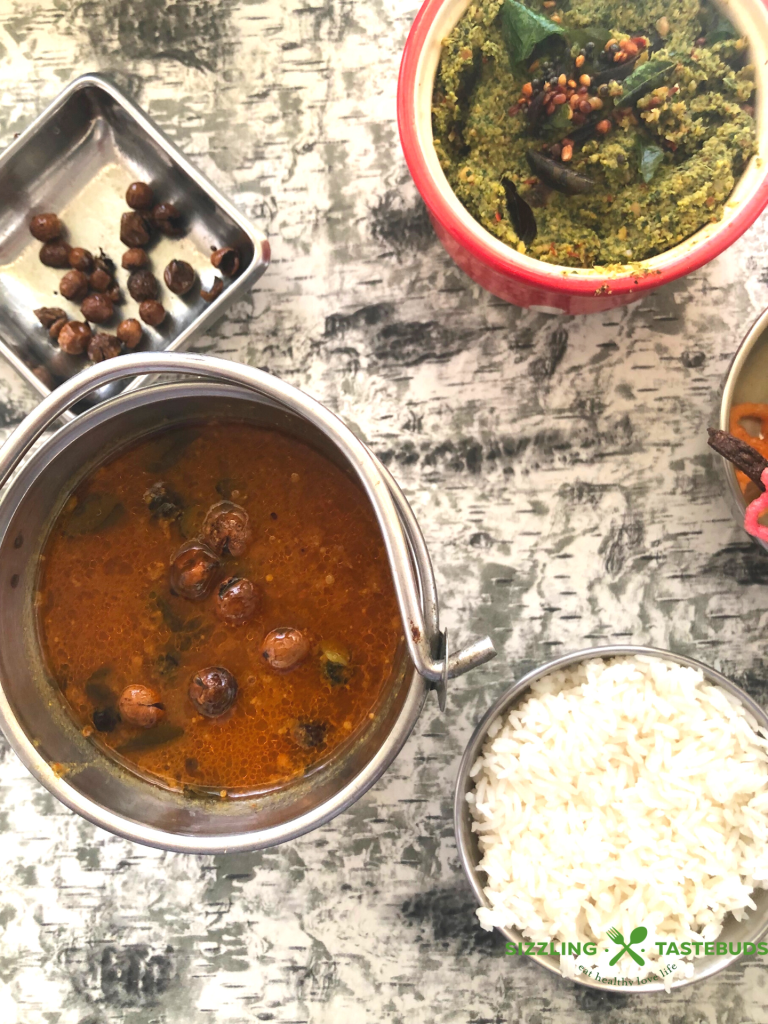 Arichuvitta Sundakkai Vatha kuzhambu is a Tamilnadu special dish made with tamarind base, sun dried condiments and a specially ground spice powder. Served with rice and Usli or Thogyal