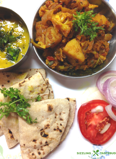 Homestyle Vegan and Gluten Free Aloo Gobhi (Potato- Cauliflower stir fry) made with basic kitchen spices. Also sometimes called Alu Gobhi ki Sabji or Gobhi-Aloo