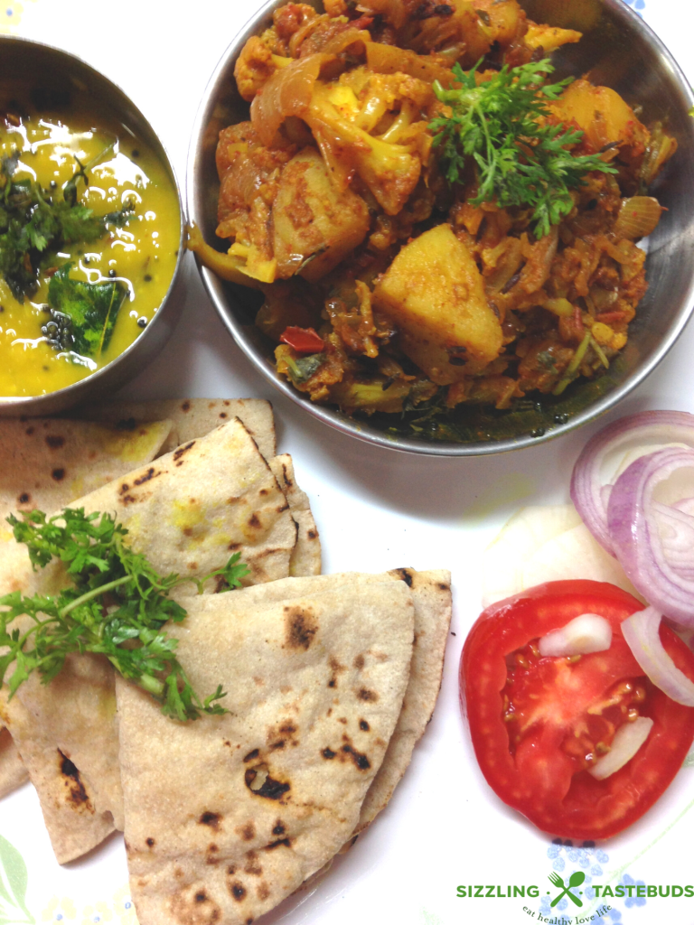 Homestyle Vegan and Gluten Free Aloo Gobhi (Potato- Cauliflower stir fry) made with basic kitchen spices. Also sometimes called Alu Gobhi ki Sabji or Gobhi-Aloo