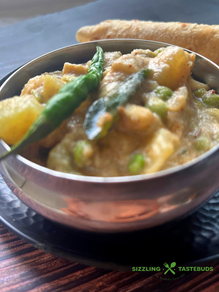 Chayote Squash and hyacinth beans curry cooked in an aromatic spice base. This Gluten Free and Vegan Kurma is best served with Roti / Chapati/ Puri or Ghee Rice in South Indian Cuisine.