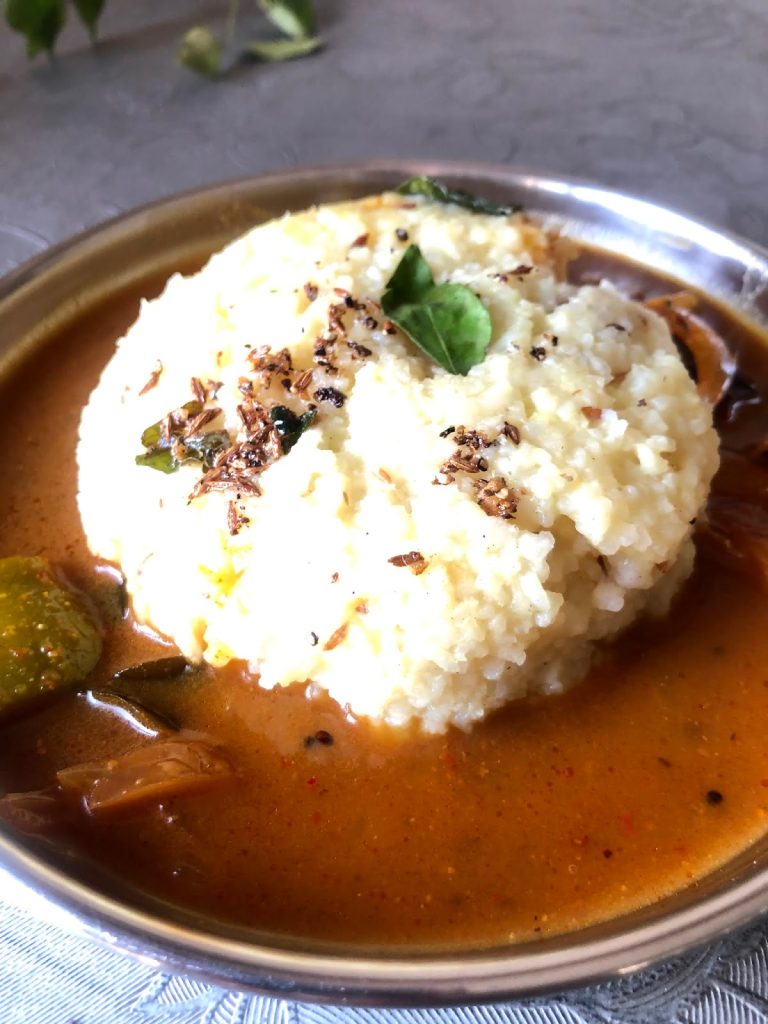 Ven Pongal is a classic dish from Tamilnadu where Rice and lentils are cooked to a pudding consistency. Offered to God at temples or made for a quick breakfast too
