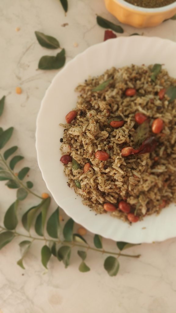 Karivepalai Sadam is a spicy and healthy One pot meal made with a special Curry Spice Powder and cooked rice. Gluten Free and Vegan, this is an easy lunch / dinner recipe!