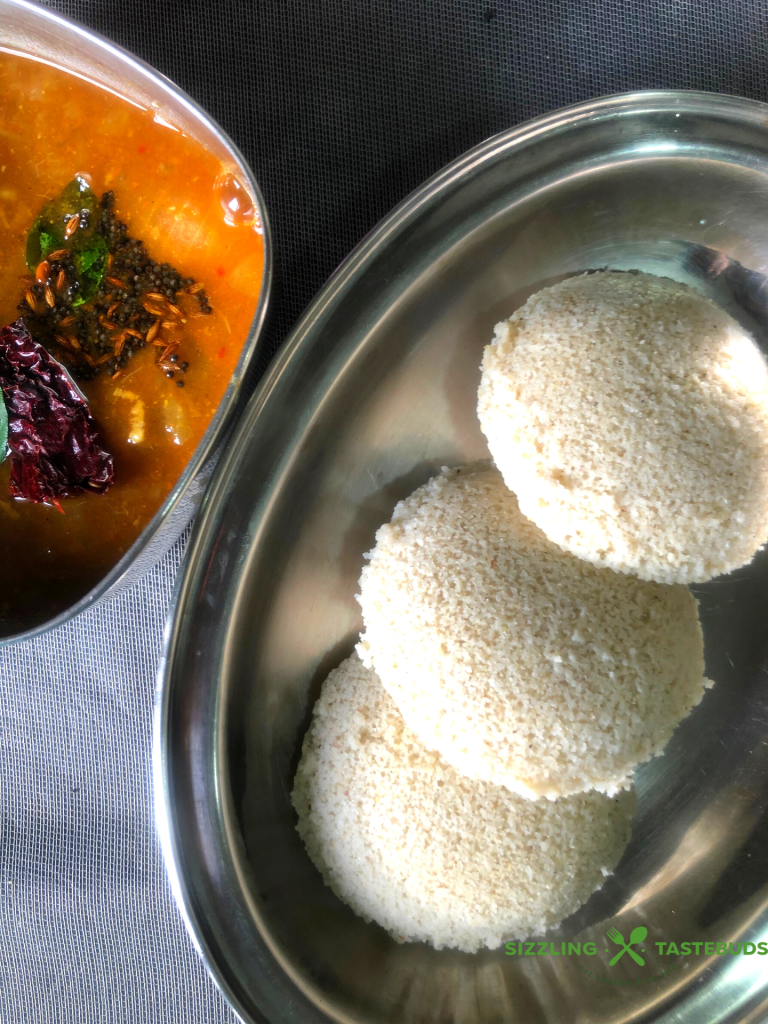 Jowar Idli | Sorghum Idli is a Gluten Free, Vegan no-Rice Idli (steamed savoury cake) made with Cracked Sorghum and Lentils. Served for Breakfast or a light dinner.