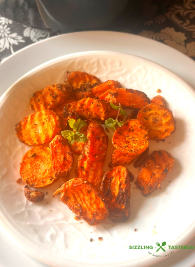 Garlic and Mint come together with carrots in this fuss free, Vegan + GF delicious dish that is made in minutes in an air fryer. Serve as a side or enjoy as a meal !  