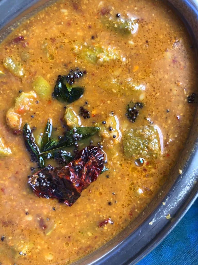 Heerekayi Huli Thovve is a Gluten Free+ vegan curry from Karnataka Cuisine. It is made from Ridge gourd simmered in a coconut based tangy spicy sauce.