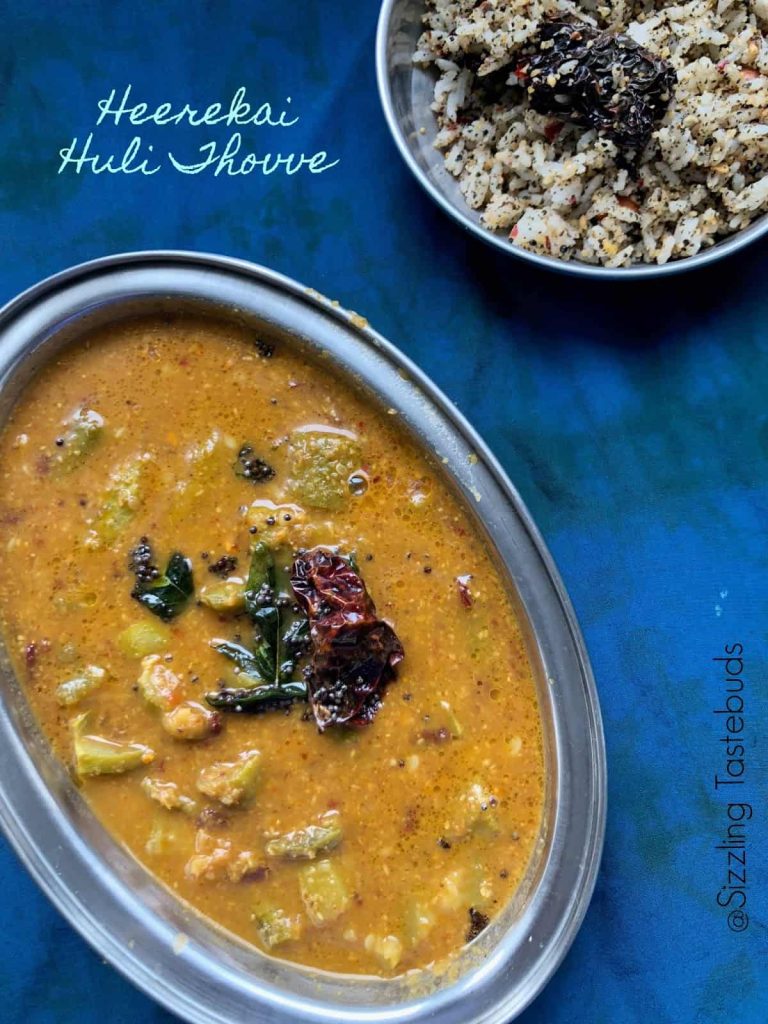 Heerekayi Huli Thovve is a Gluten Free+ vegan curry from Karnataka Cuisine. It is made from Ridge gourd simmered in a coconut based tangy spicy sauce.