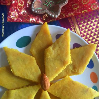 Badam Burfi or Almond Fudge is a delicious and irresistible sweet made from Almond meal, sugar. This makes for a quick treat for sweet tooth or during Diwali too!