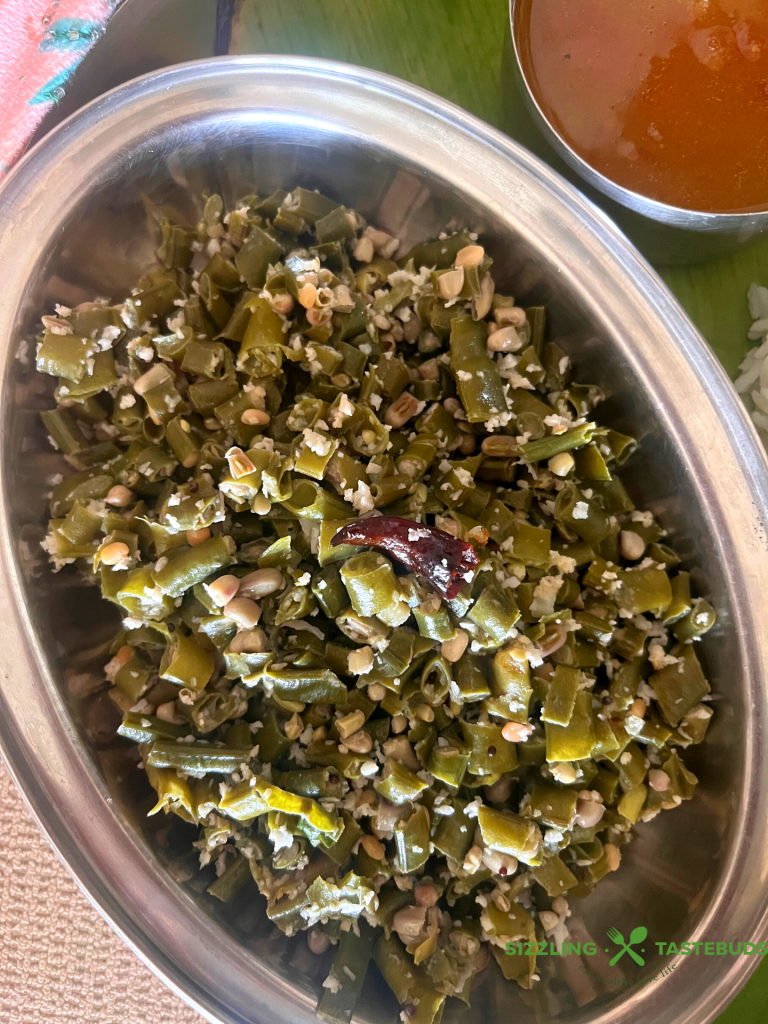 Achinga Payar Thoran refers to a no onion no garlic stir fry with long yard beans, tempered with coconut. Usually served with Rice + Sambhar or Rasam